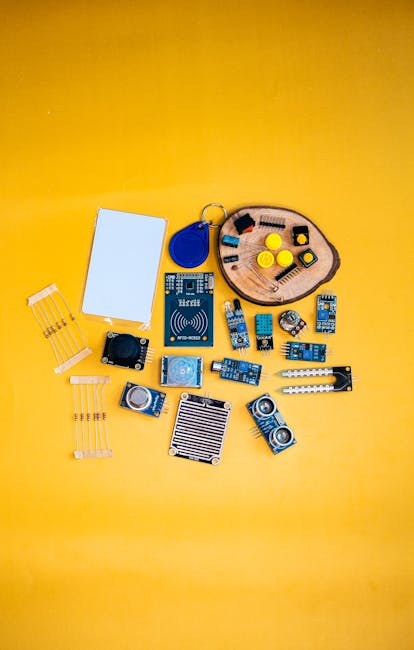 Developer working on code at a desk with dual monitors